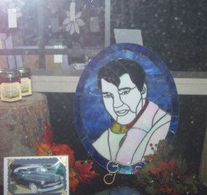 A leaded glass craft of Elvis appears in a down town shop. Photo KDG