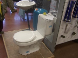 Dual flush toilet grand opening of plumbing shop