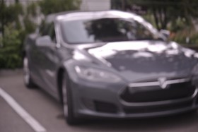 Nofossil, a Tesla model S charging. The rear plate says nofossil Photo KDG