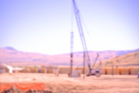 A crane drives piles at the 200 million dollar cogen facility in Merritt BC Photo KDG