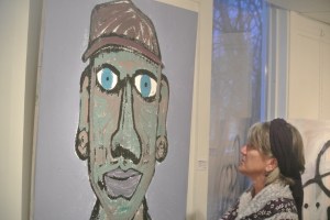 Local museum curator Jackie looks on Joel reis charactkure of his Dad, Photo KDG